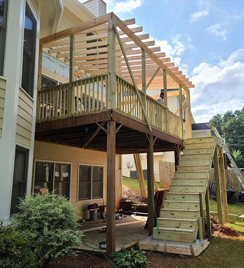 Enhance your outdoor living with our deck installations in Kennesaw, GA. Custom design accepted. Speak with our expert today.