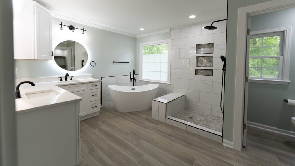 Modern bathroom renovation with freestanding tub, custom vanity, and walk-in shower in Marietta