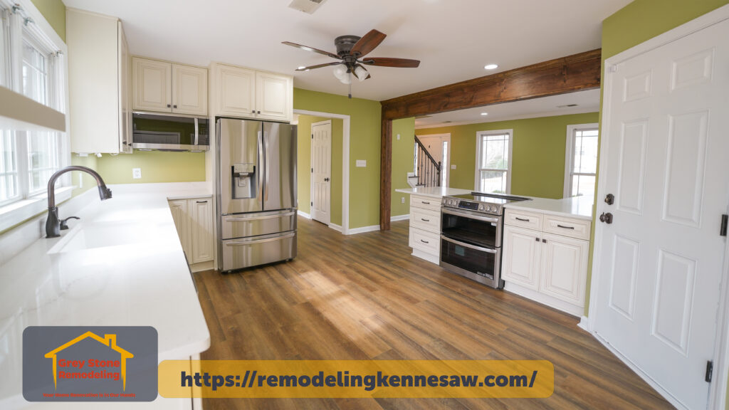 Fully Renovated kitchen with striking rustic wooden beam, custom cabinets, open space, and abundant natural light that maximizes natural light, creating a warm and modern atmosphere in Kennesaw