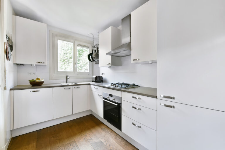 Well-organized small kitchen remodel with bright interior design.