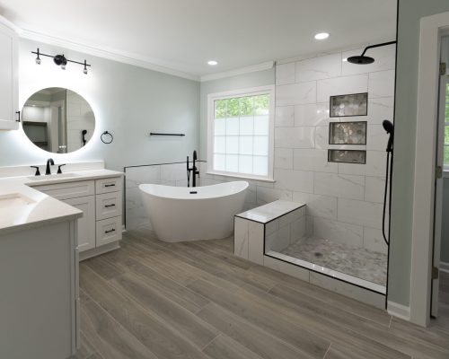 Modern bathroom renovation with freestanding tub, custom vanity, and walk-in shower in Marietta