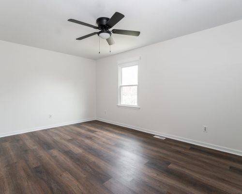New vinyl plank flooring installation in renovated room – Grey Stone Remodeling in Dallas, Georgia